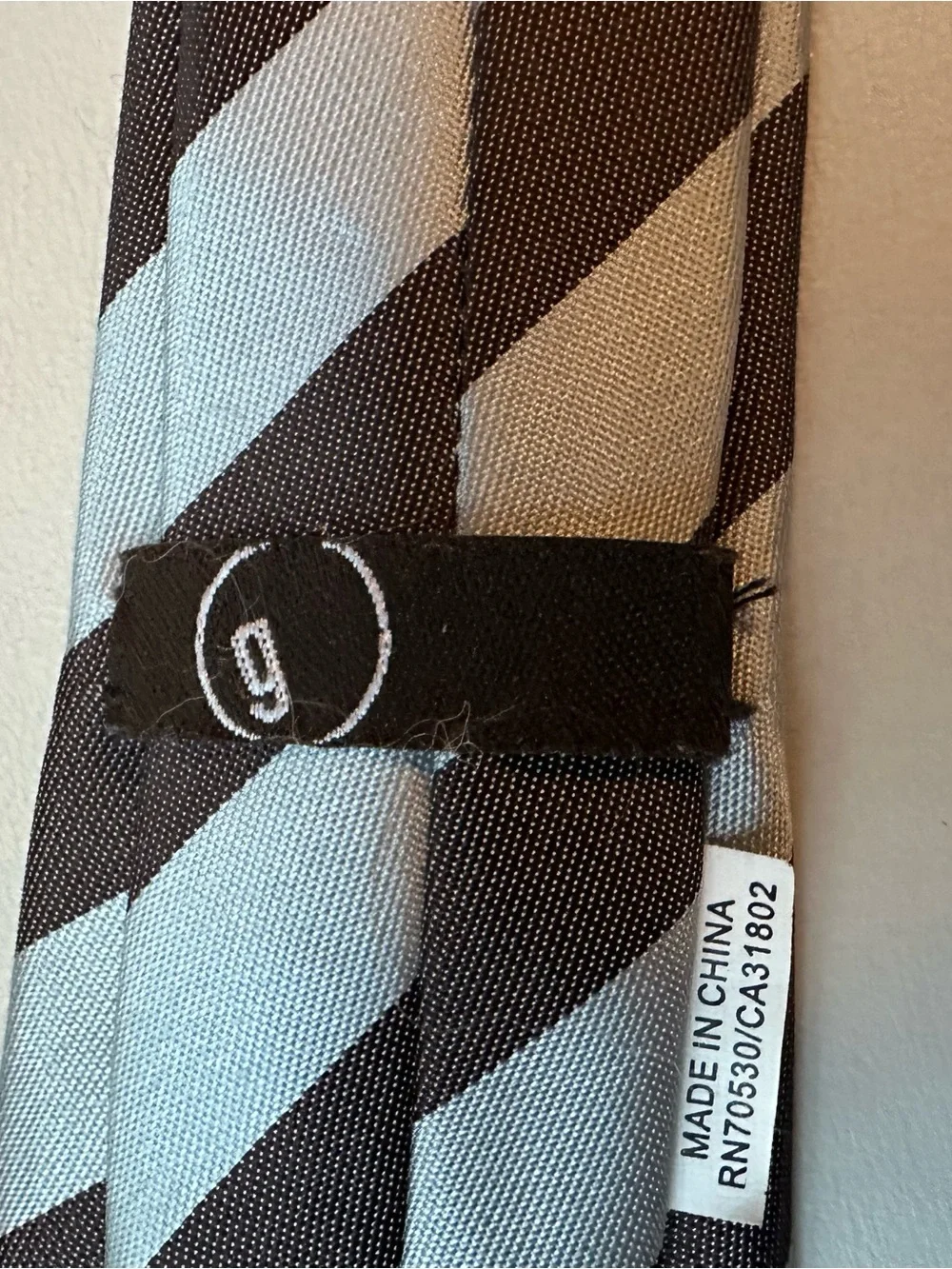 Striped brown and blue kids tie with Velcro closure